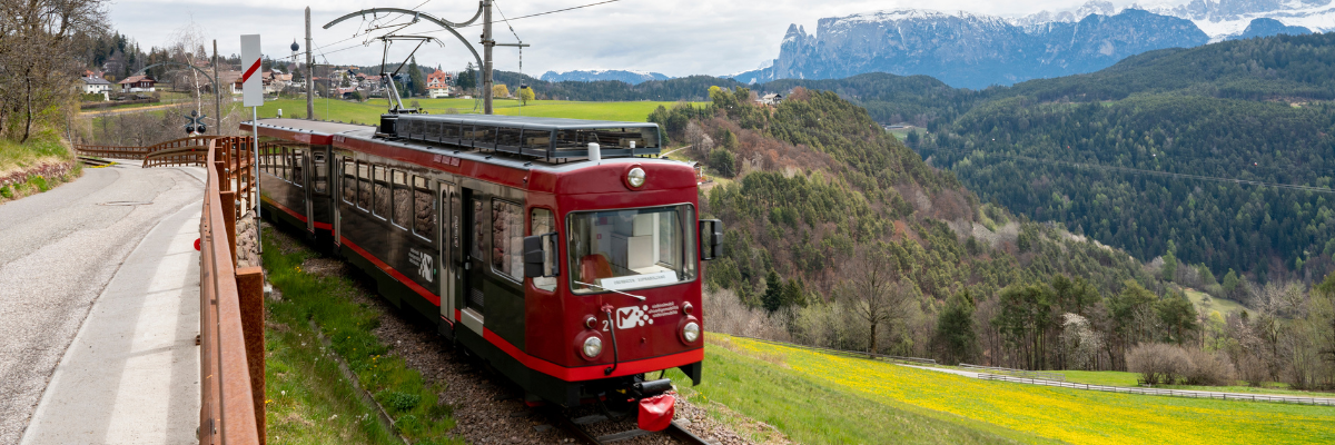 Renon railway and mountains